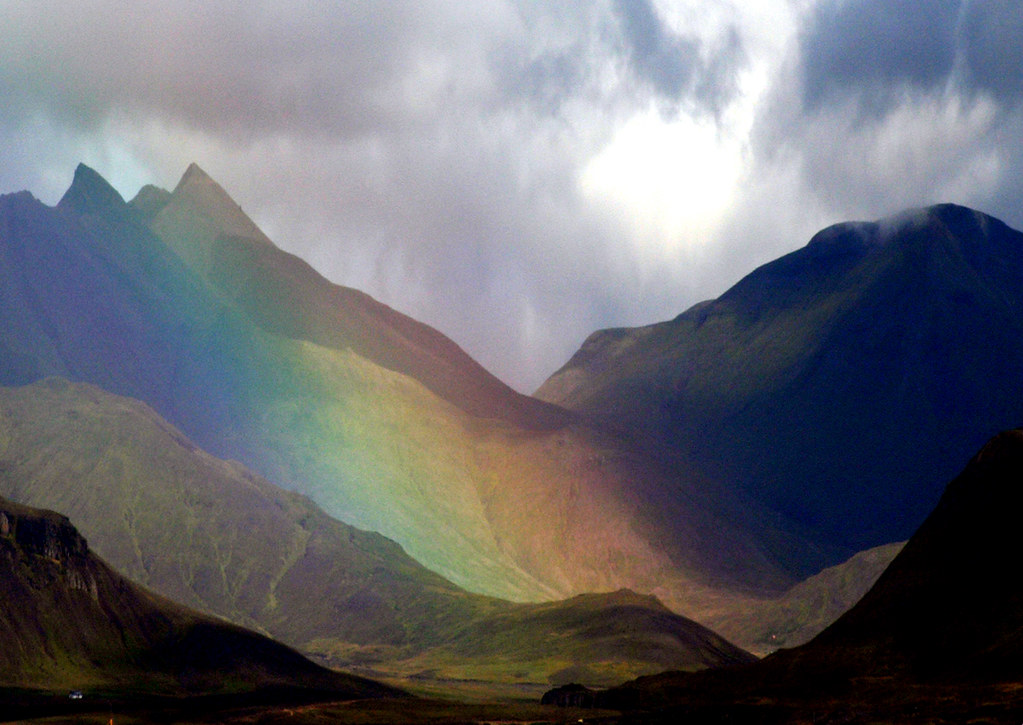 Alt text:A Rainbow found in the Mountainside